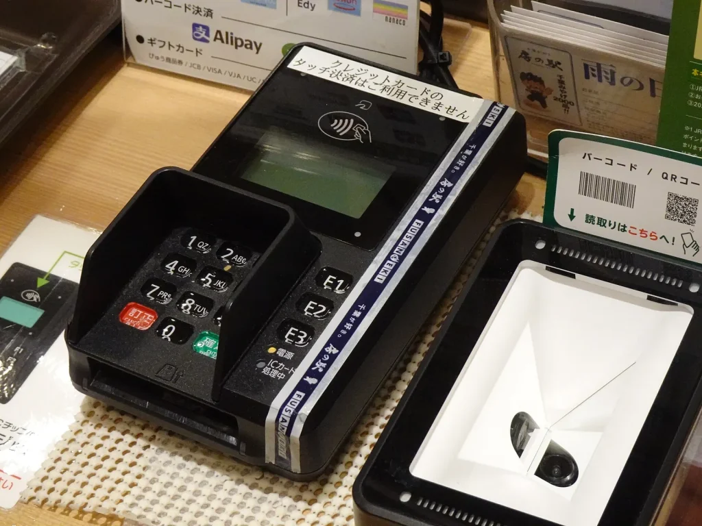 Card payment terminal at a service counter — VAT and E-Invoicing for UAE Car Rental Companies
