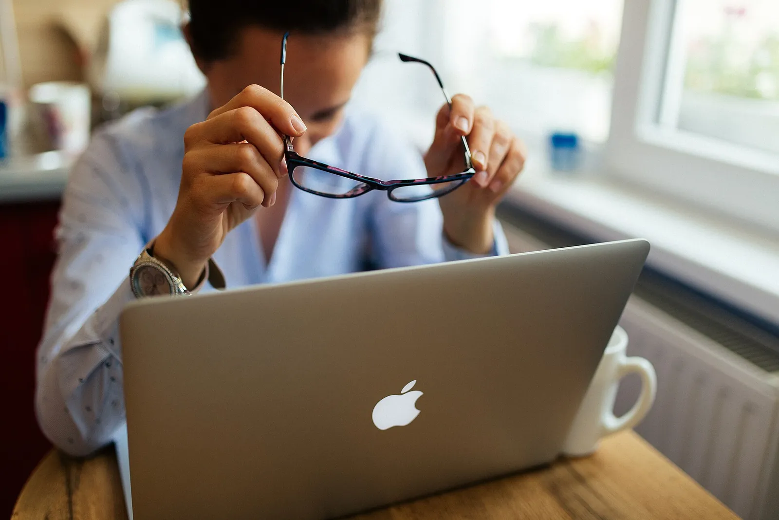 Man reviewing work on a laptop